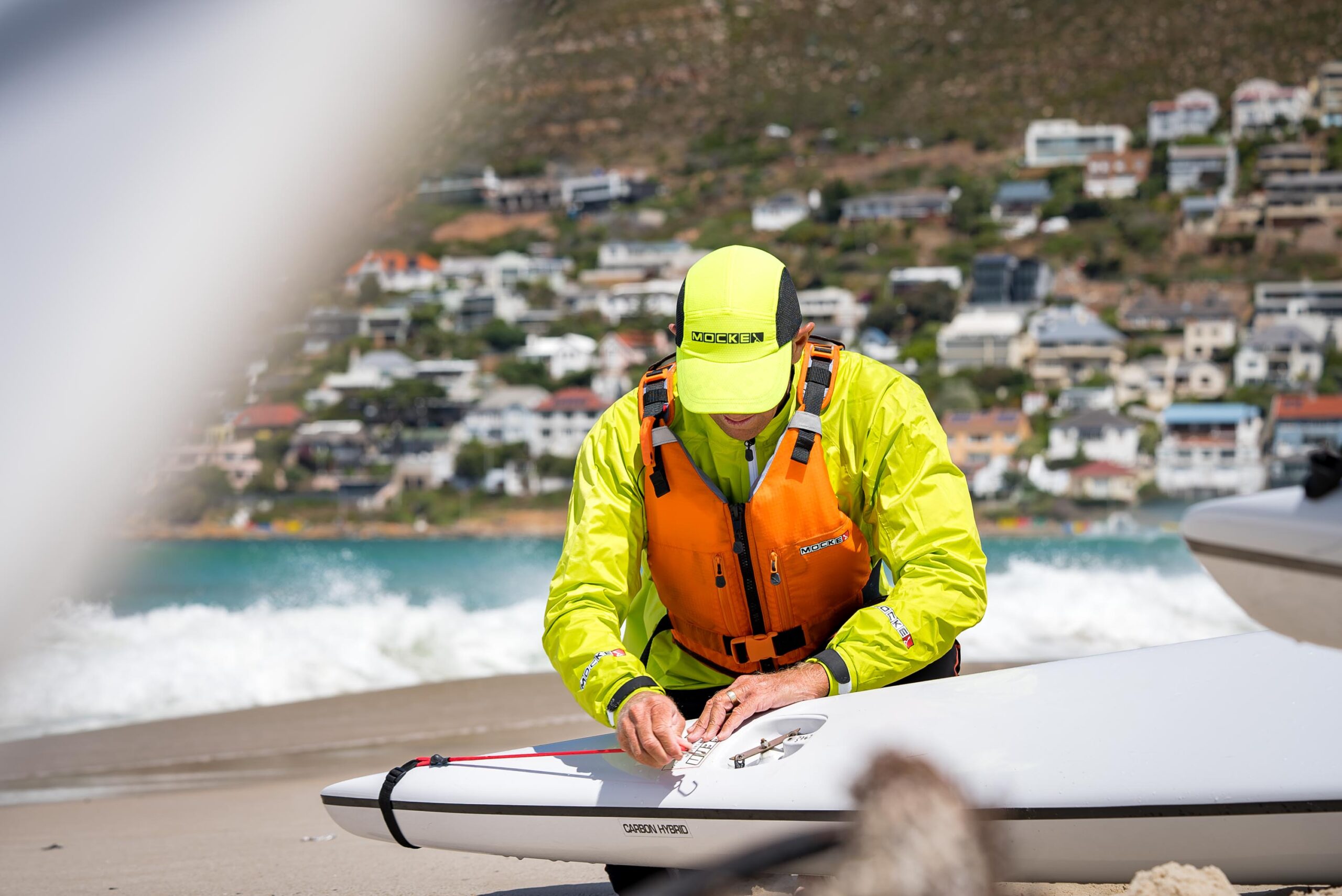 Demonstration of how to attach a Mocke Emergency Steering cord to the back of a surfski or kayak